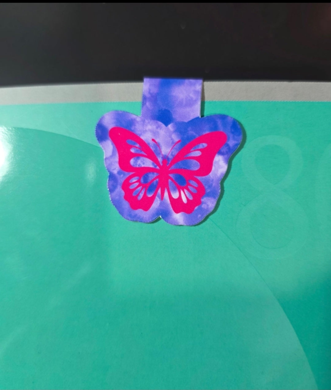 Small Red butterfly on purple background