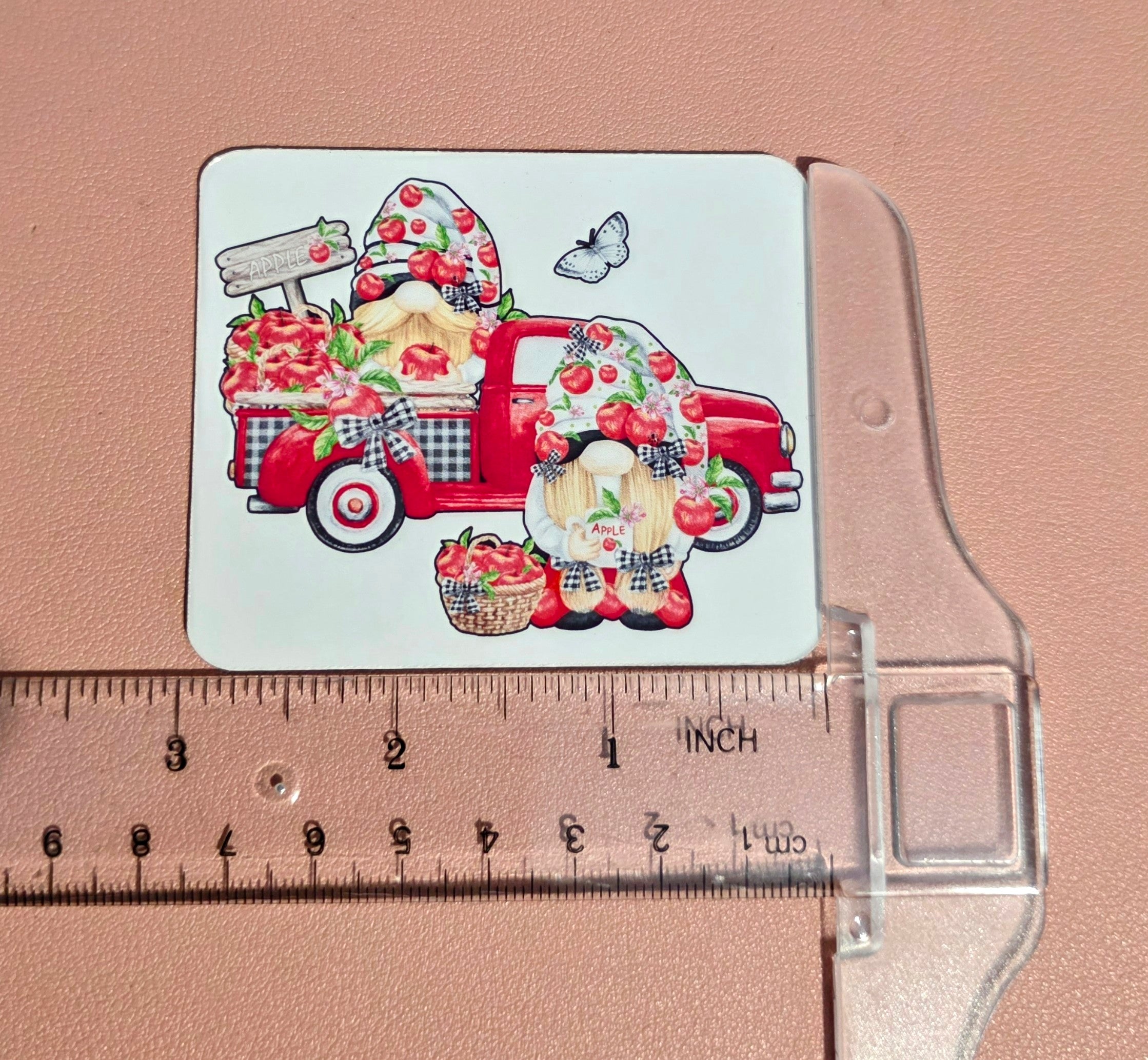 Gnome with truck of apples