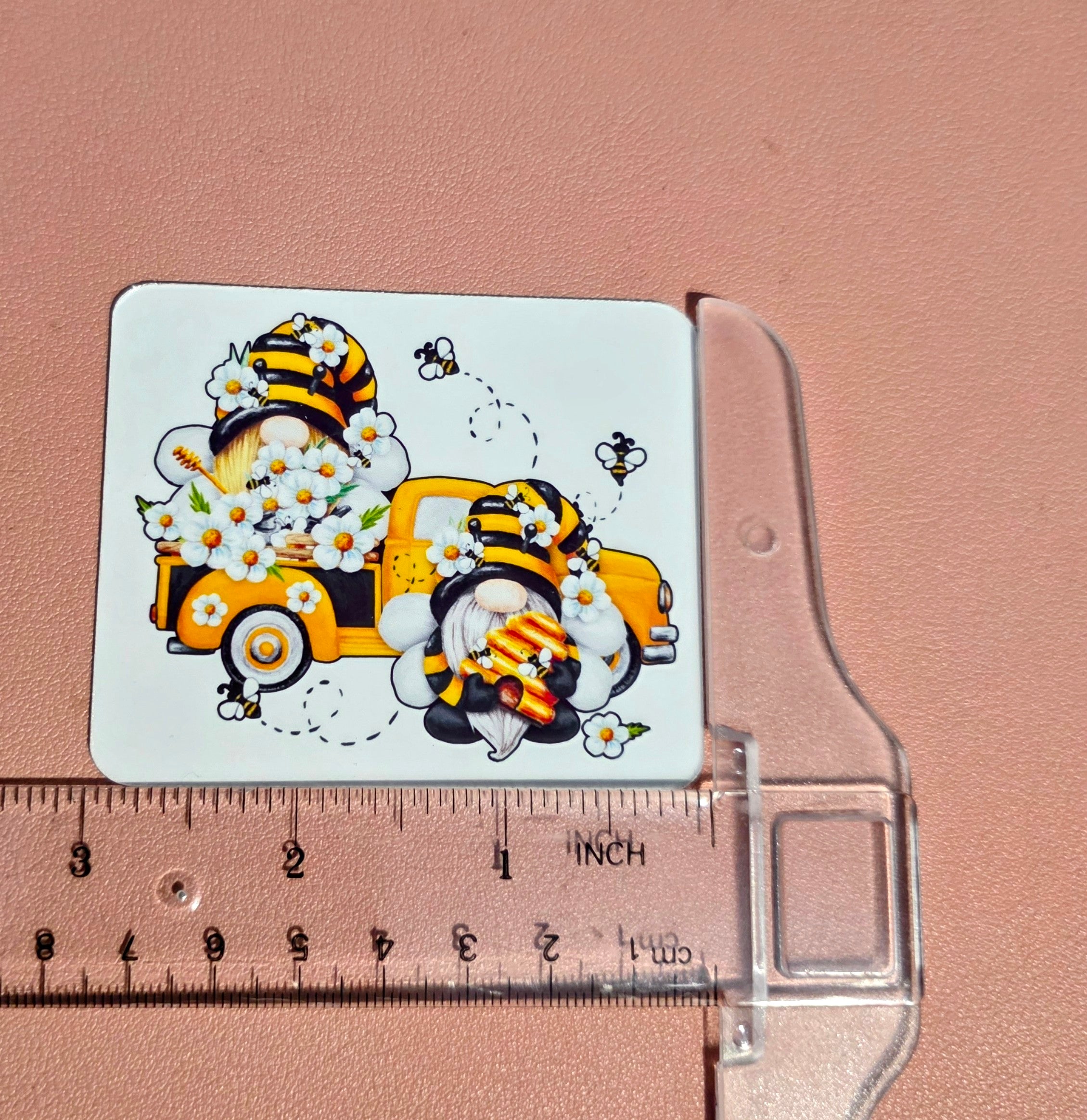Gnomes with a truck of daisies and bees